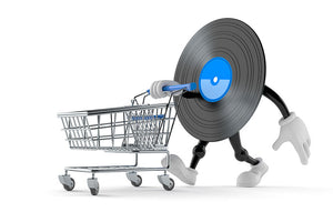 Vinyl character with shopping cart