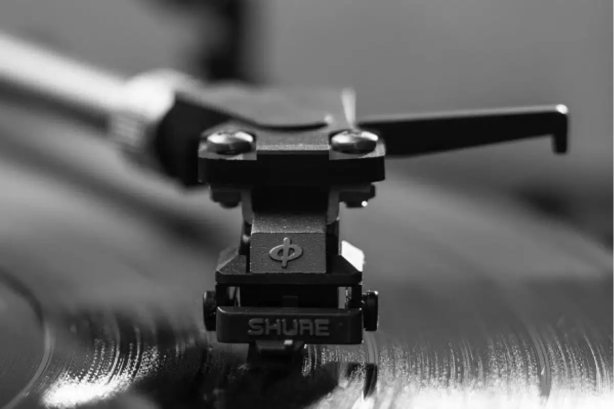 Close-up of a record player needle playing on a vinyl.
